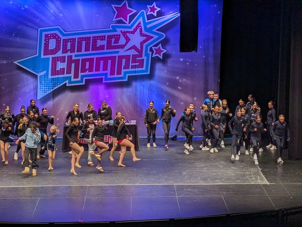 Performers gathered at a Dance Champs event